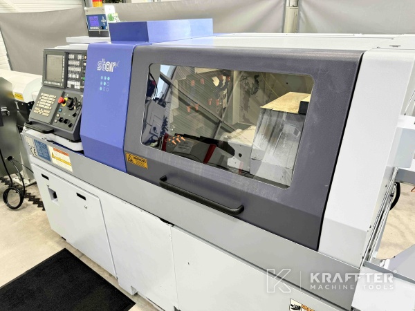 International buying and reselling Swiss-type CNC lathe STAR SR32 J Type N 90077